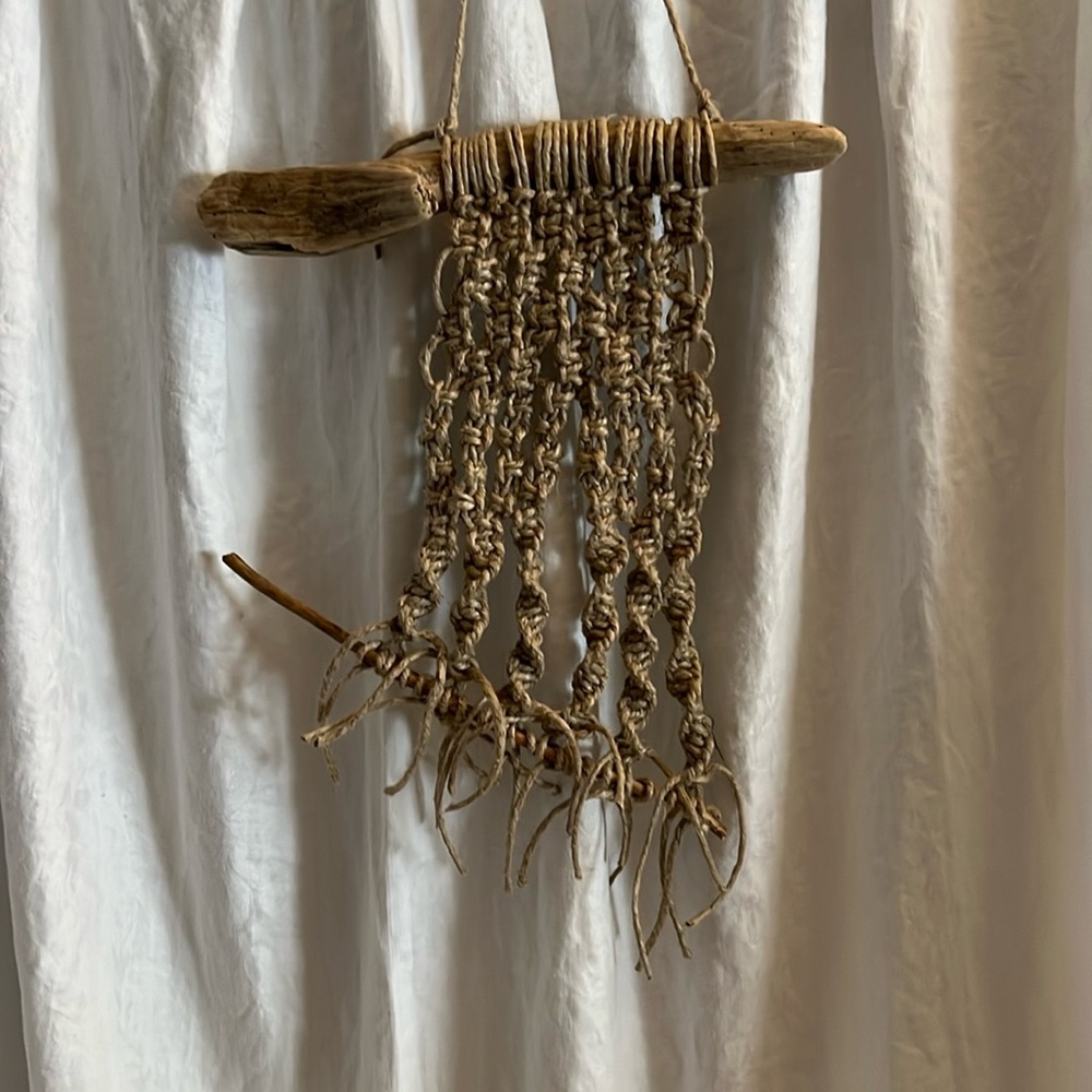Macrame wall hanging with driftwood